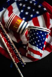 Looking down at American themed flag plates and cups for July 4th