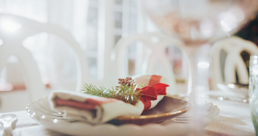 Close Up of a Cotton Napkin with Festive Decorations Prepared for a Family Dinner at Home to Celebrate Thanksgiving Day or Christmas.