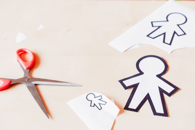 Funny paper toys near scissors