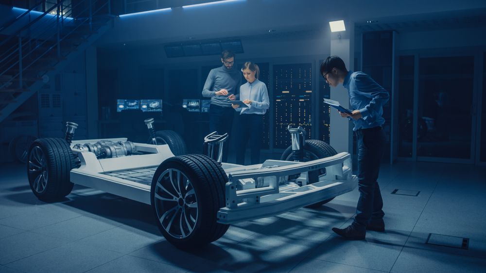 In Automotive Innovation Facility Concept Vehicle Frame Includes Tires, Suspension, Engine and Battery