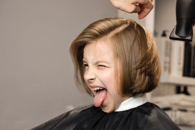 Child Modeling a Bob Haircut
