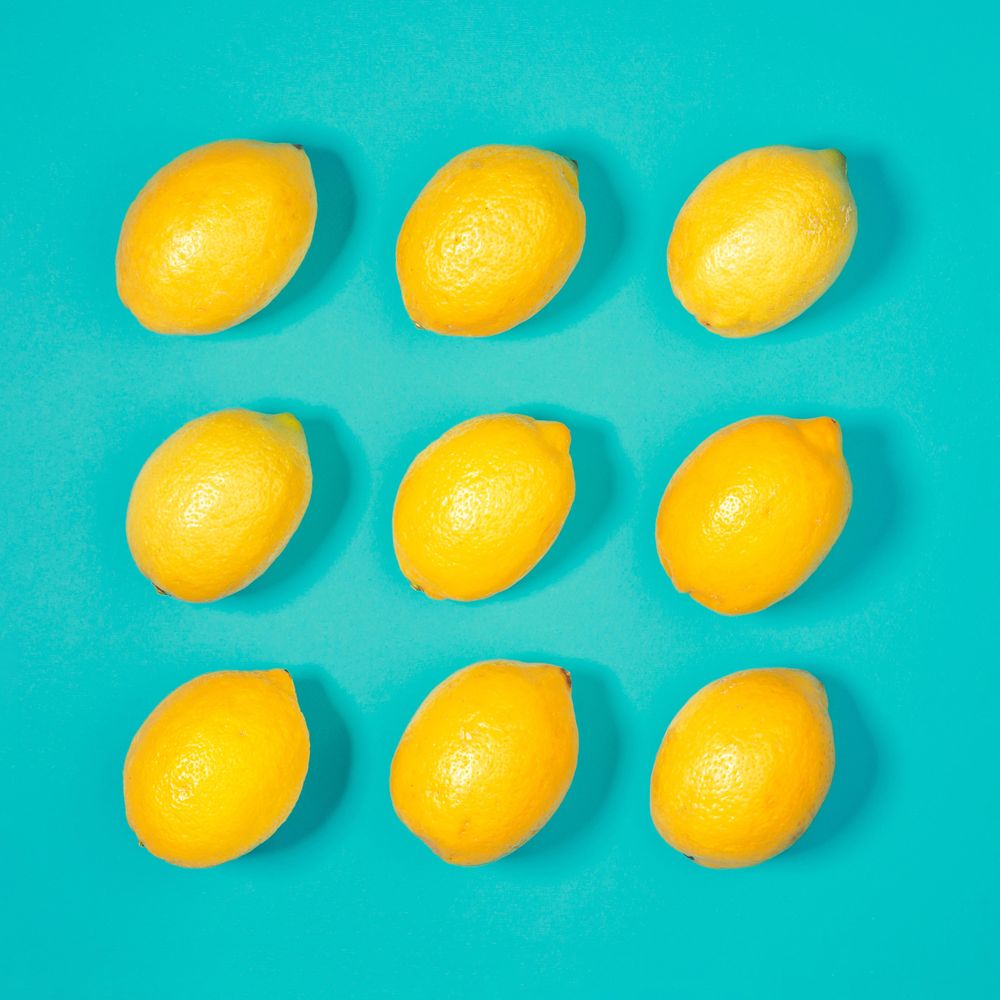 Lemons on bright blue background