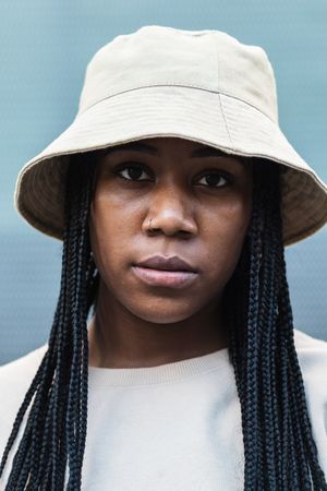 Young Black woman in hat
