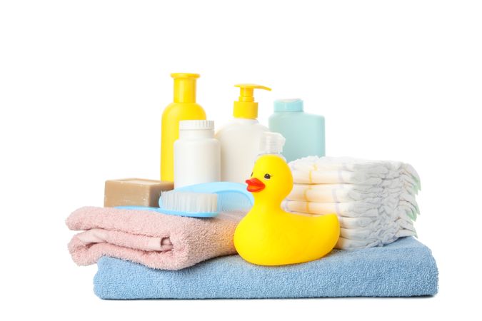 Baby hygiene accessories isolated on light background