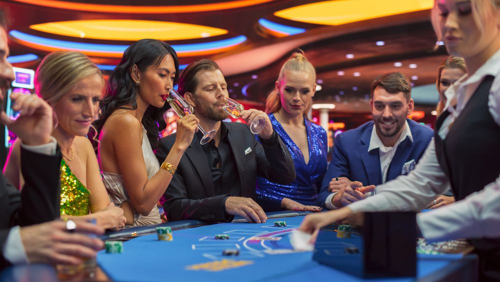 Happy Glamorous Couple Spending a Night Out in Stylish Modern Casino.