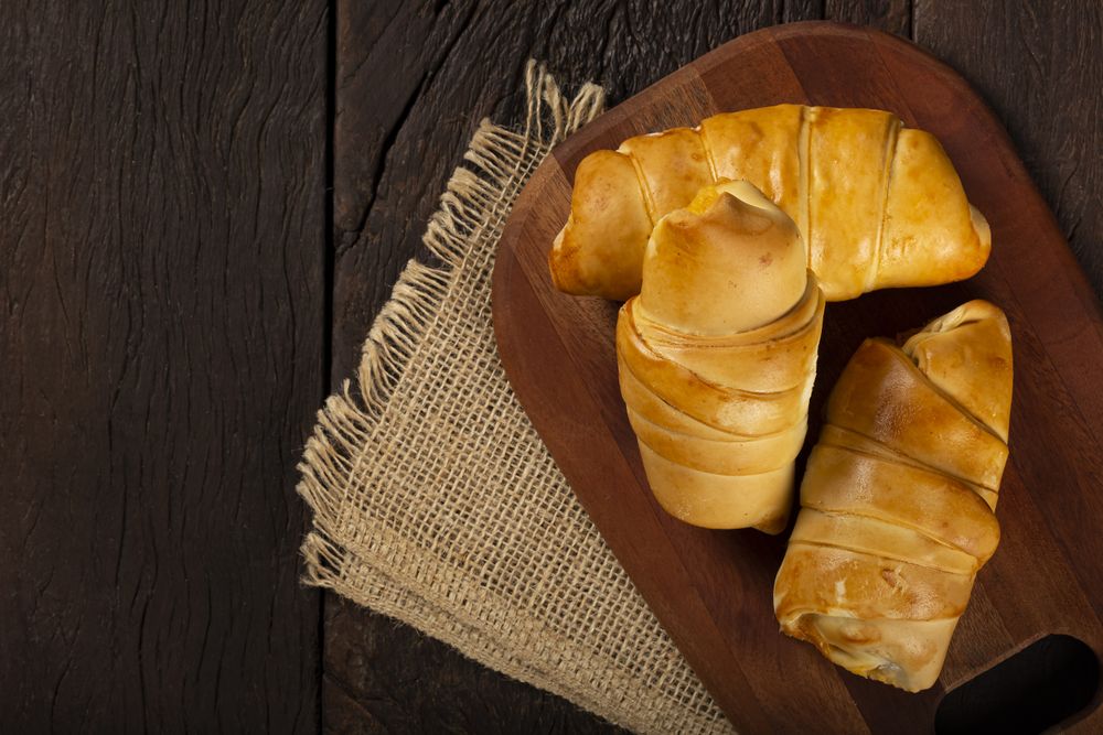 Traditional fresh baked croissants on the table.
