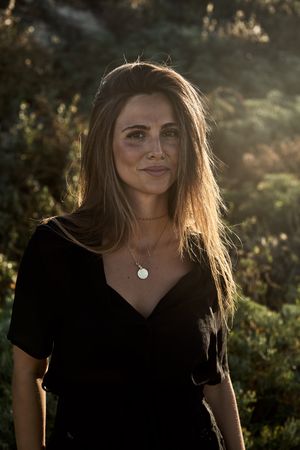 Cheerful woman looking away