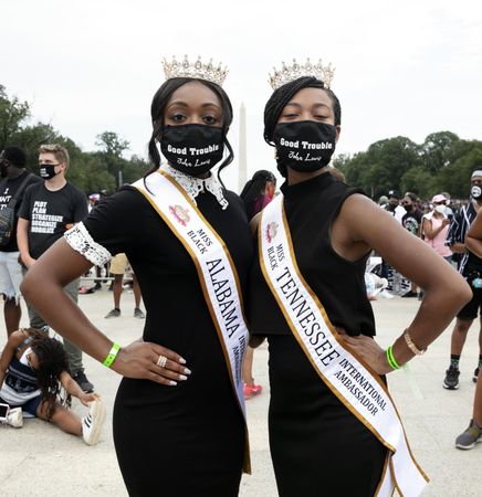 Two “Miss Black International Ambassadors” at BLM event, Washington, D.C.