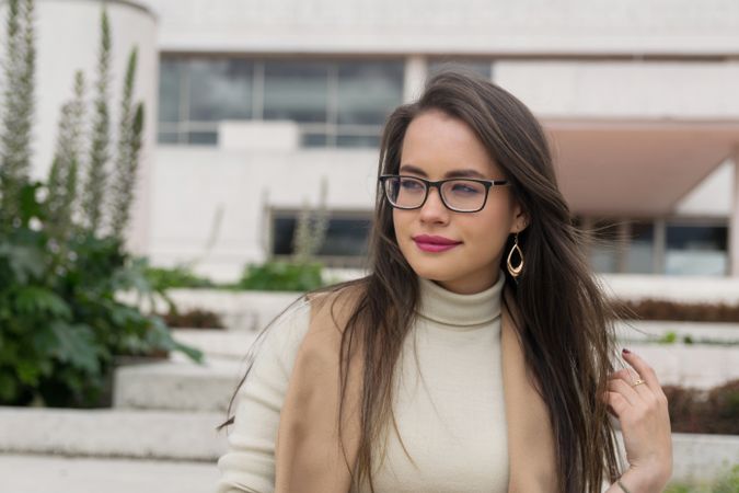 Woman in glasses looking away