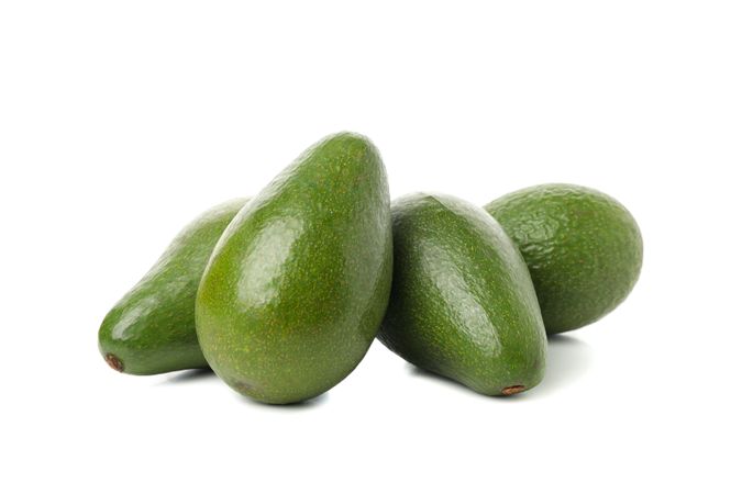 Ripe fresh avocado isolated on plain background