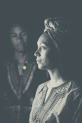 Black man looking at thoughtful woman