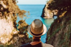 Female tourist contemplating picturesque landscape