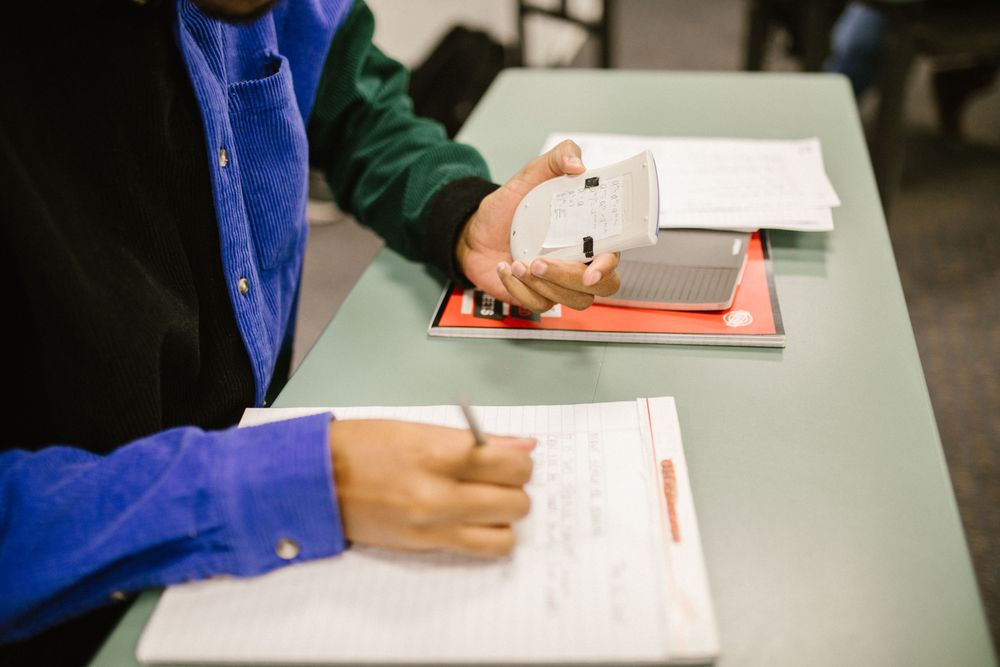 Cropped image of student cheating