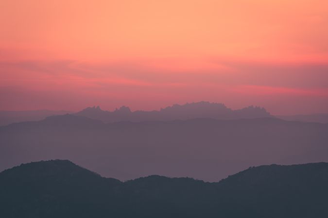 Sunset sky over mountain ridge