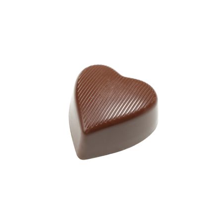 Tasty chocolate candy in the heart form isolated on studio background