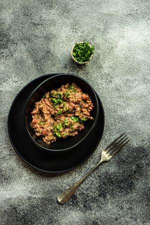 Traditional Georgian dish lobio in dark bowl