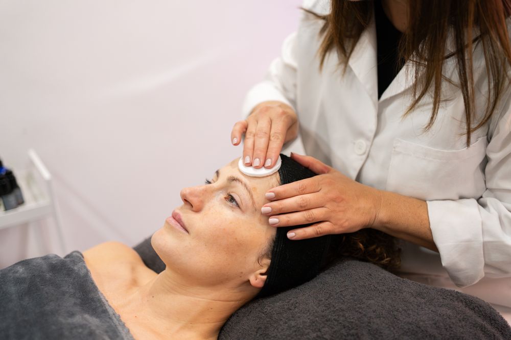 Woman receiving beauty treatment