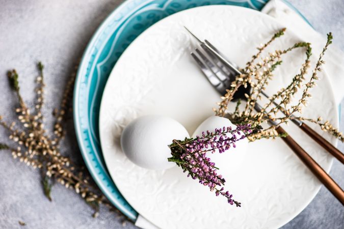 Easter table setting with heather and egg decor