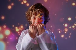 Cheerful boy in white kimono