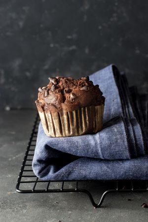 Chocolate banana muffin on towel