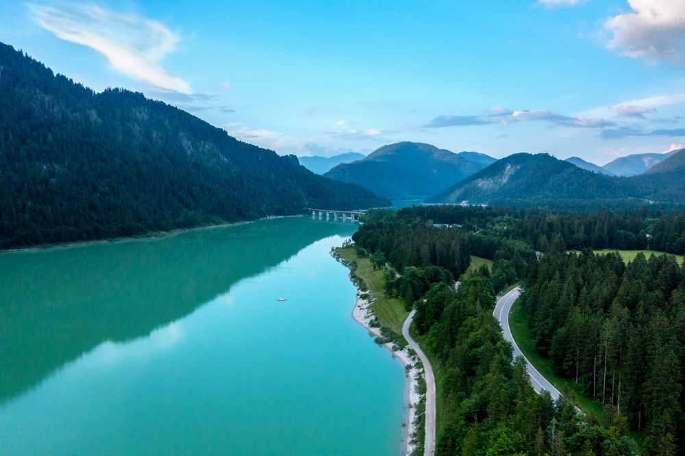 Aerial view in Bavarian Alps, with the lake Sylvenstein surrounded by mountains and forest