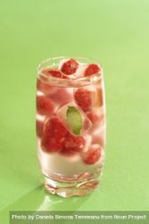 Glass of water and frozen fruit 47M8a0
