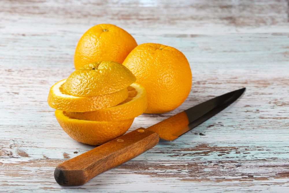 Sliced oranges on the table.