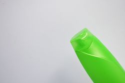 Green shampoo bottle without labels