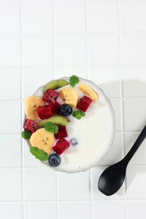 Plain Greek Yogurt with Fresh Blueberries, Diced Dragon Fruit, Sliced Banana,  and Kiwi Fruit