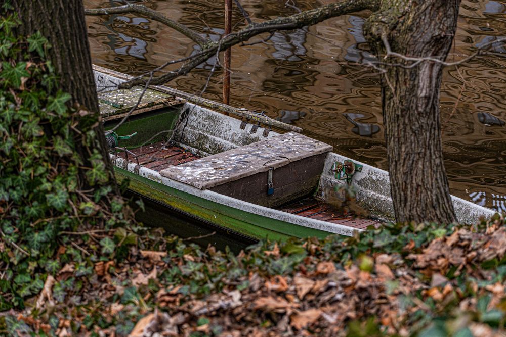 Old wooden boat in Vltava river