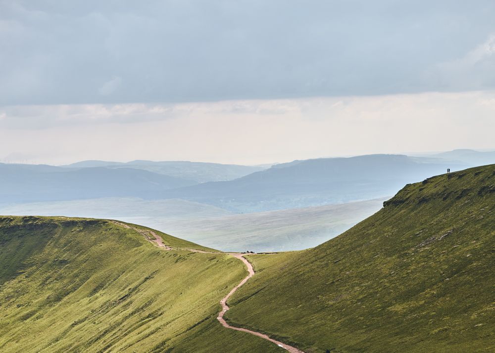 Pathway on the Brecon Beacons mountain range on an overcast day