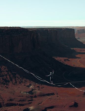 Person tightrope walking in Grand Canyon