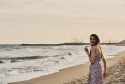 Woman with dress at the beach