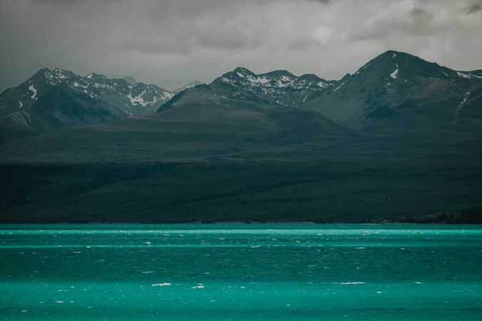 Sea coast with turquoise water and rocky mountains