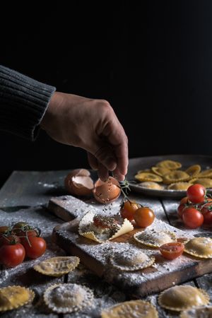 Homemade ravioli made with parmesan cheese, tomato and basil.
