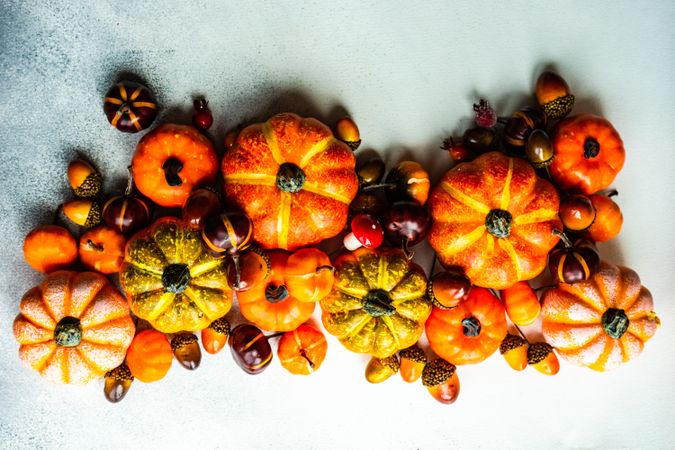 Top view of pumpkin ornaments on light table