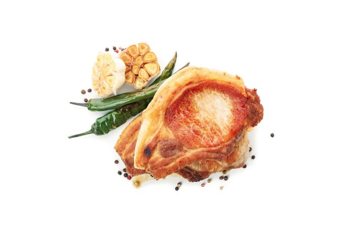 Fried steaks isolated on blank background. Grilled food