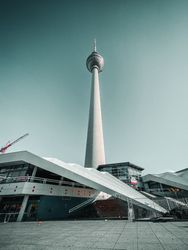 Berlin TV tower behind a modern building