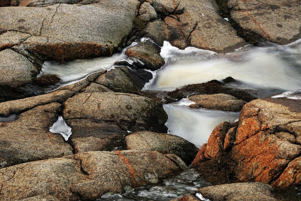 Scenic ice covered mountain river in daylight