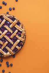 Flat lay with delicious blueberries dessert