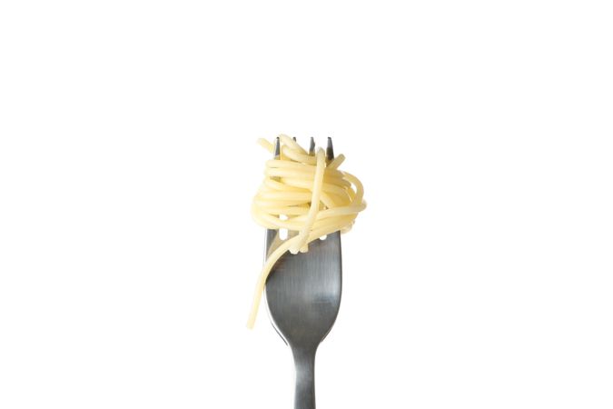 Fork with tasty pasta isolated on blank background