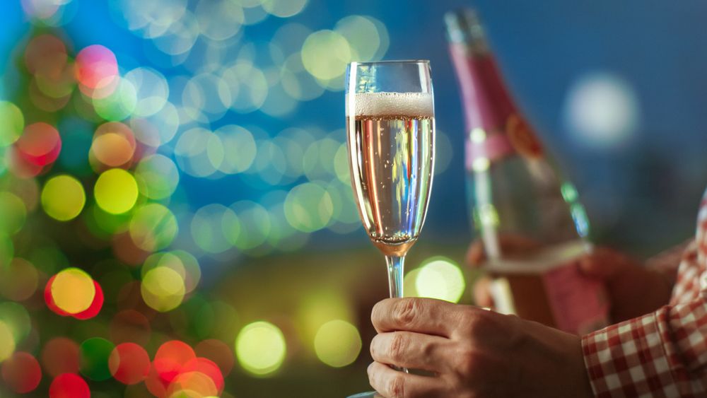 Man Holding Glass of Champagne.