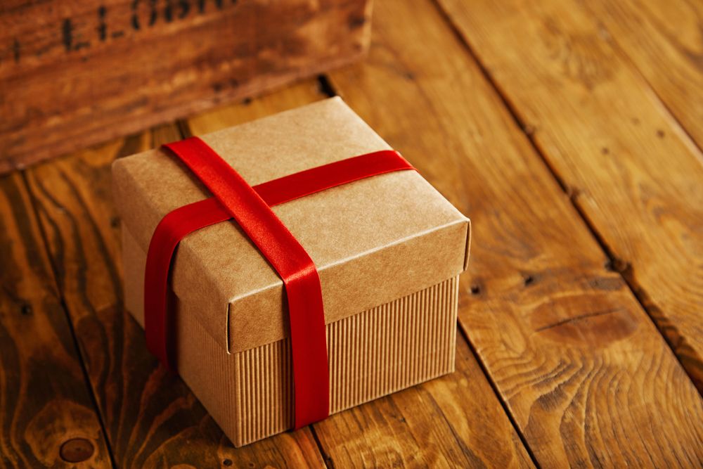 Cardboard presents with a red ribbon