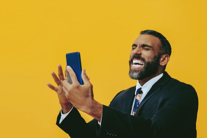 Animated Black businessman in suit yelling at smartphone screen