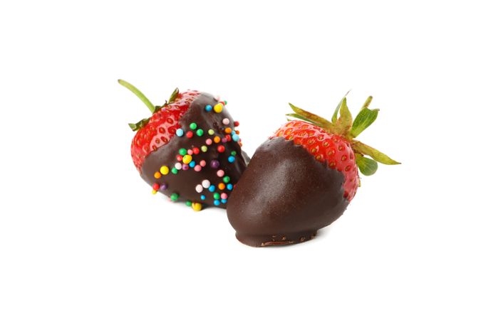 Chocolate fondue. Strawberry in chocolate isolated on plain background