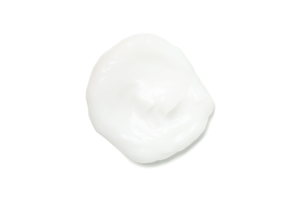 Cream spot isolated on blank background. Cosmetics. Hygiene