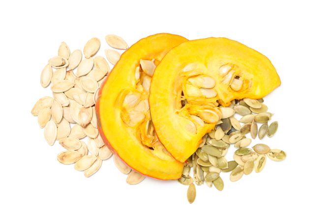 Concept of Autumn vibe food, Pumpkin, Pumpkin seeds, isolated on light background
