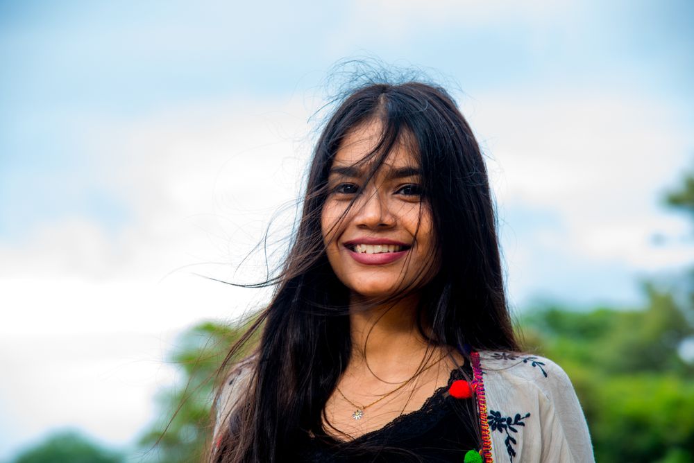 Smiling woman standing outdoor