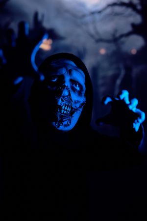 Terrible zombie walking towards camera