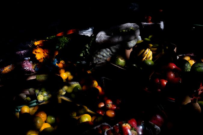 Shadows over fruit and flowers stall